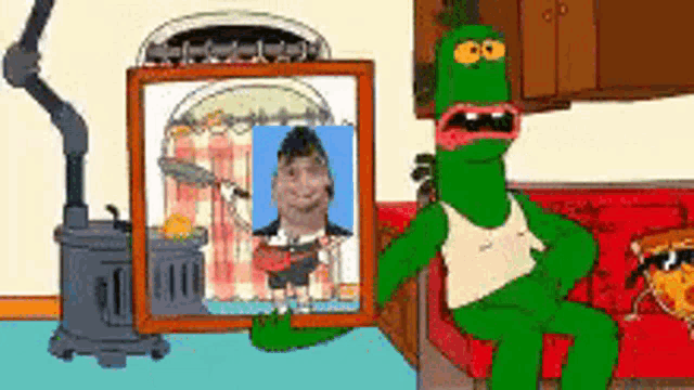 a green cartoon character is holding a picture of a man
