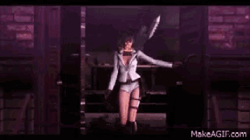 a woman in a white suit is holding a sword and a crown .