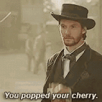 a man in a suit and hat is saying you popped your cherry .