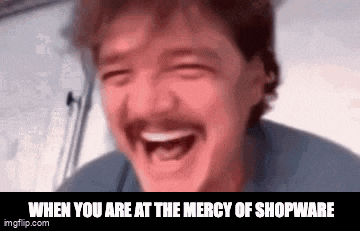 a man with a mustache is laughing with his mouth open and the words `` when you are at the mercy of shopware '' .