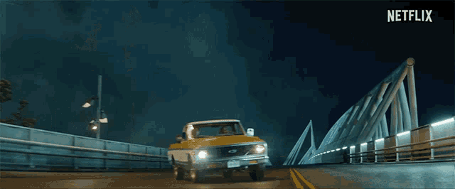 a car is driving on a bridge with netflix written on the bottom