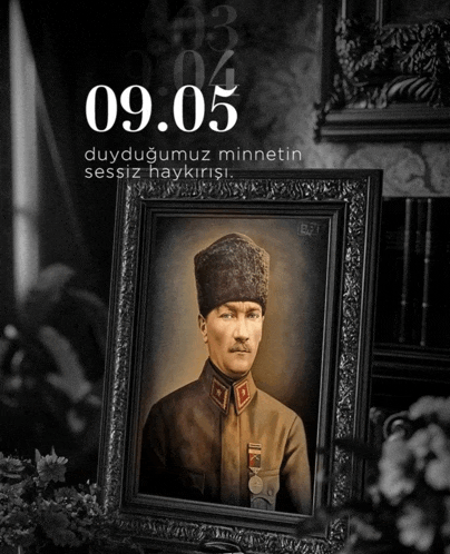 a framed picture of a man with the date 09.05 on the bottom
