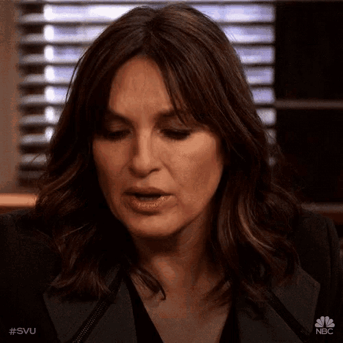 a close up of a woman 's face with #svu written on the bottom