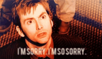 a man in a suit and tie says i 'm sorry