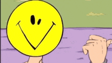 a cartoon character with a smiley face on his face .