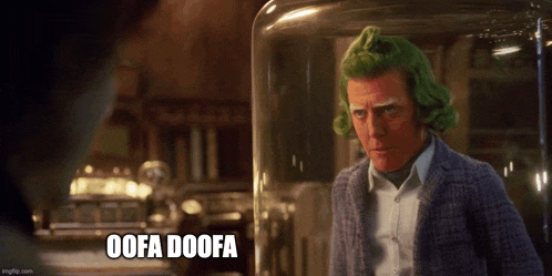a man with green hair is standing in front of a glass jar that says oofa doofa on it