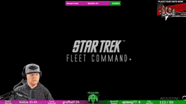 a star trek fleet command advertisement with a man in front of a microphone