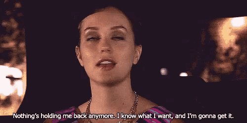 a woman is sitting in a car and says nothing 's holding me back anymore