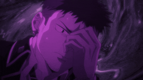 a close up of a man 's face with purple lighting