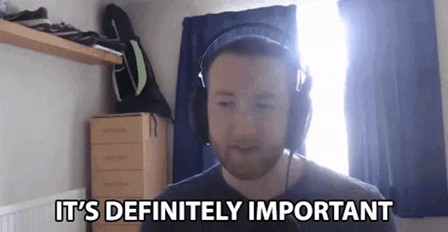 a man wearing headphones is saying " it 's definitely important "