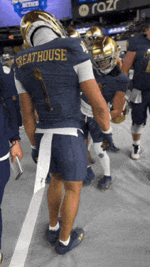 a football player with the name greathouse on the back of his shirt