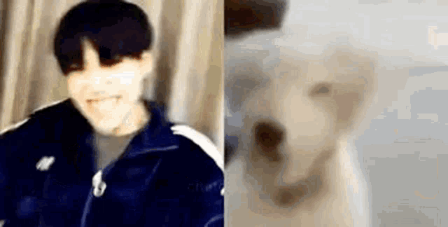 a man in a blue jacket is smiling next to a close up of a dog .