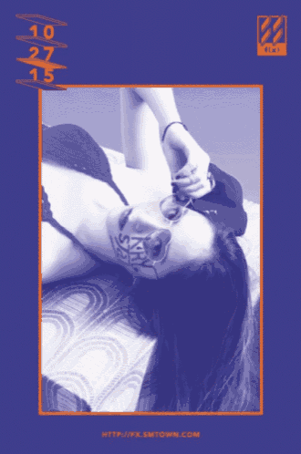 a poster with a woman laying on a bed and the words http://fx.smtown.com at the top