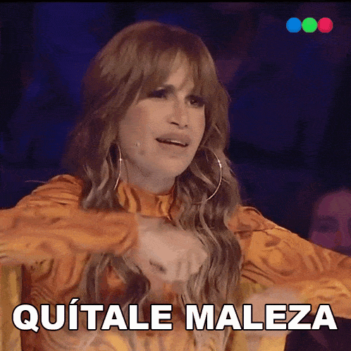 a woman in an orange dress with the words quitale maleza written above her