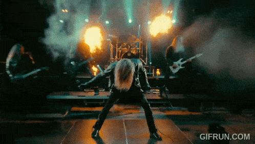 a video of a band performing with a gifrun.com logo in the lower right corner