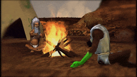 a man with a beard sits in front of a fire with another man