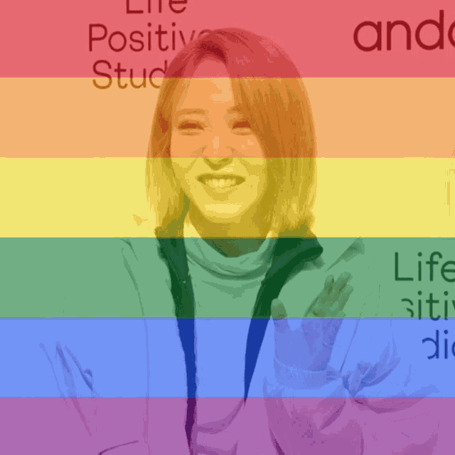 a picture of a woman with a rainbow colored background that says life positive stud