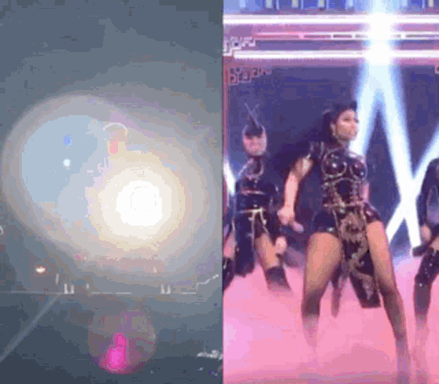a woman in a black dress is dancing on a stage with smoke coming out of her skirt