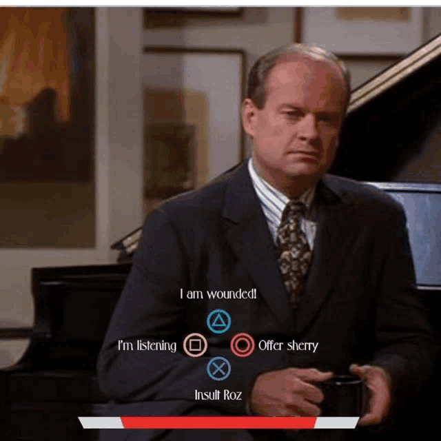 a man in a suit and tie is sitting in front of a piano holding a cup of coffee while playing a video game