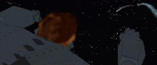 a young boy is flying through the air in a robot costume .