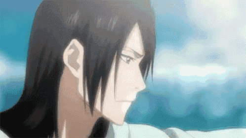 a close up of a person 's face in a bleach anime .