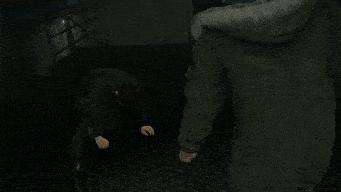 a computer generated image of a person in a suit looking up at the earth