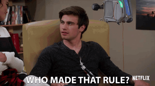 a man sitting in a chair with a needle in his arm and the words who made that rule netflix on the bottom