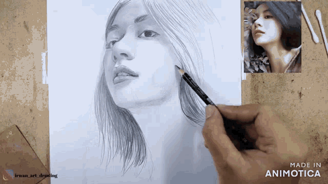 a person is drawing a woman 's face with a pencil