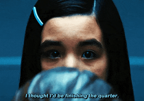 a close up of a girl with the words i thought i 'd be finishing the quarter