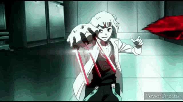 a man in a lab coat is holding a pair of red scissors in his hands .