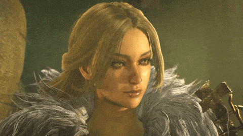 a close up of a woman 's face in a fur coat