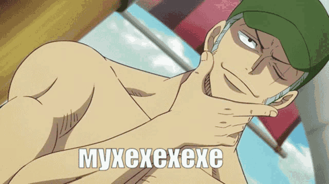 a man in a green hat holds his hand to his chin and says myxexeexe