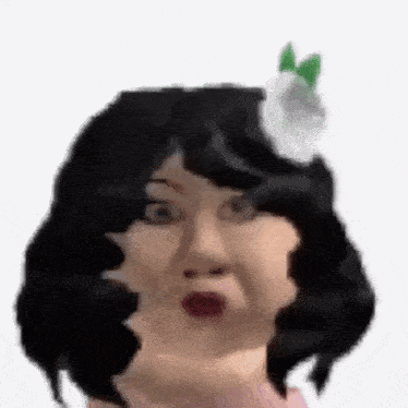 a close up of a person 's face with a flower in her hair .
