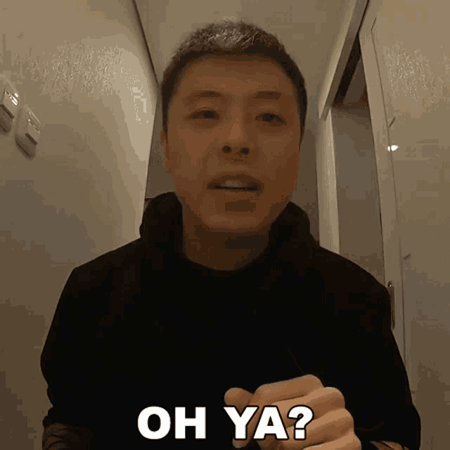 a man is making a funny face and says " oh ya "