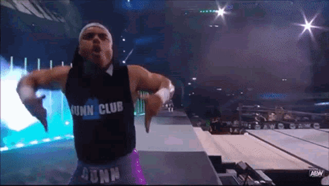 a wrestler with a shirt that says junn club on it