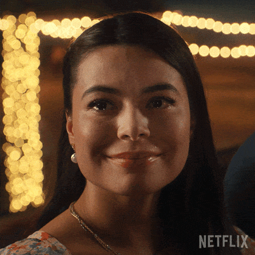 a close up of a woman 's face with the word netflix on the bottom