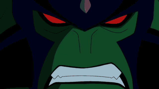 a close up of a cartoon character 's face with red eyes and sharp teeth