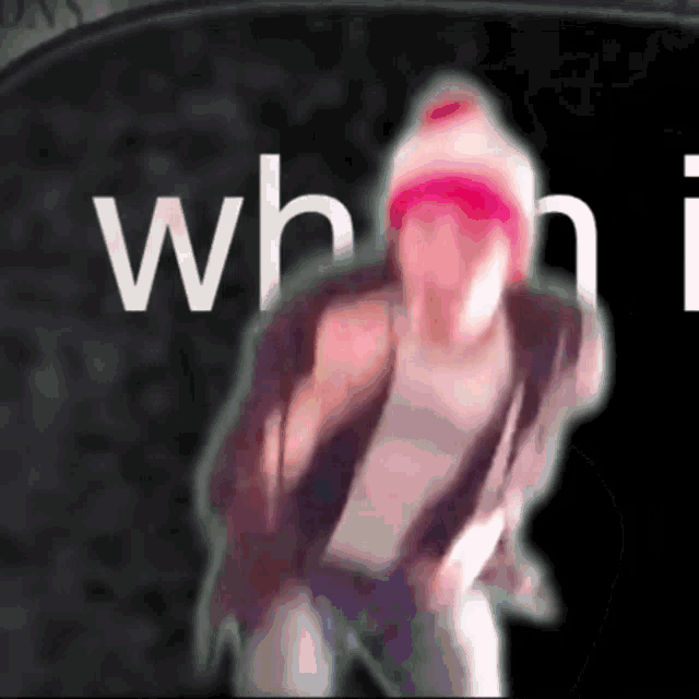 a blurred image of a person with the word whi on the bottom