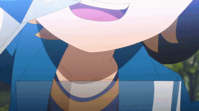 a close up of a person wearing a blue shirt