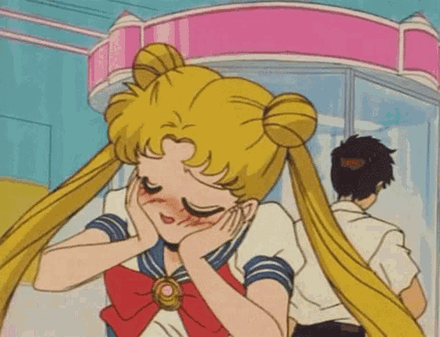 sailor moon is covering her face with her hands while standing next to a man in front of a store .