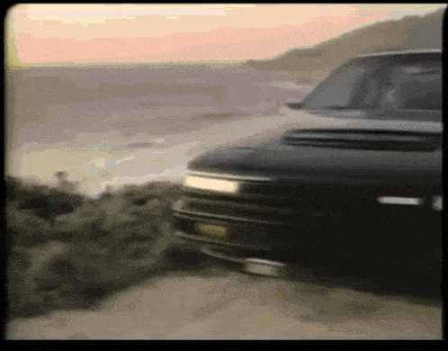 a black car with a license plate that says ' sr ' on it