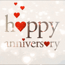 a happy anniversary card with red hearts and snowflakes