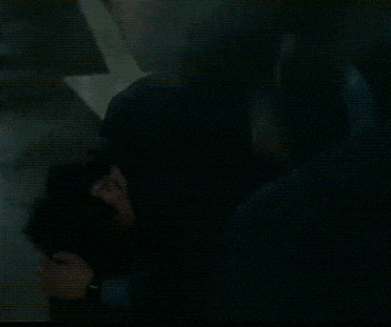 a close up of a person 's shoulder in a blurry photo
