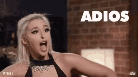 a woman in a black dress is screaming with the word adios in the background