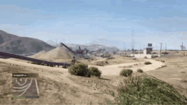 a screenshot of a video game shows a road going through a desert landscape