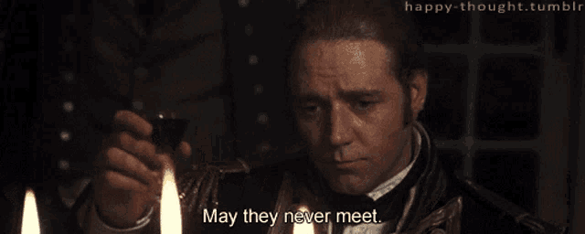 a man lighting a candle with the words may they never meet