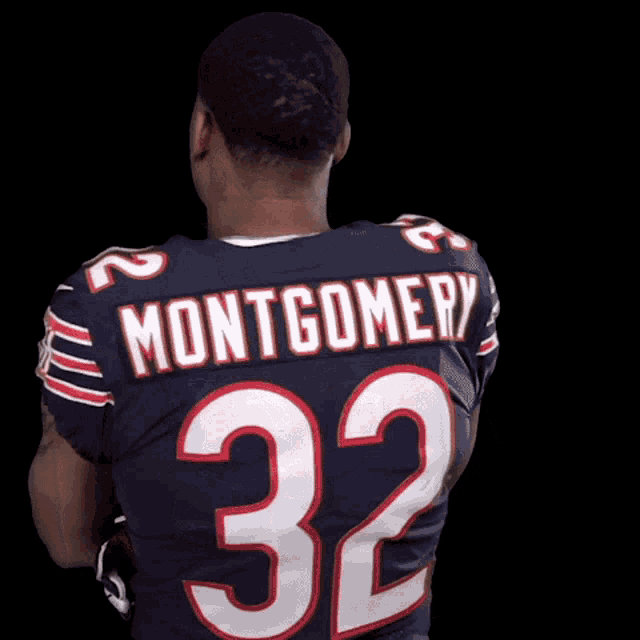 a man in a chicago bears jersey with the number 22 on it