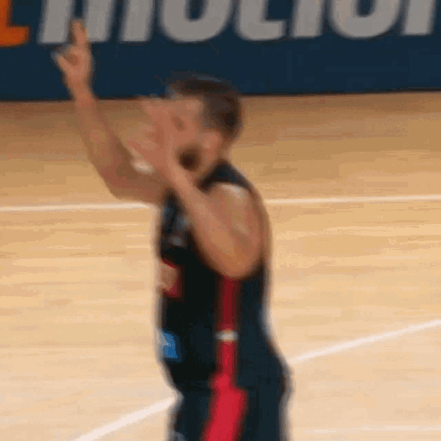 a blurry picture of a basketball player on a court with the word lithium in the background