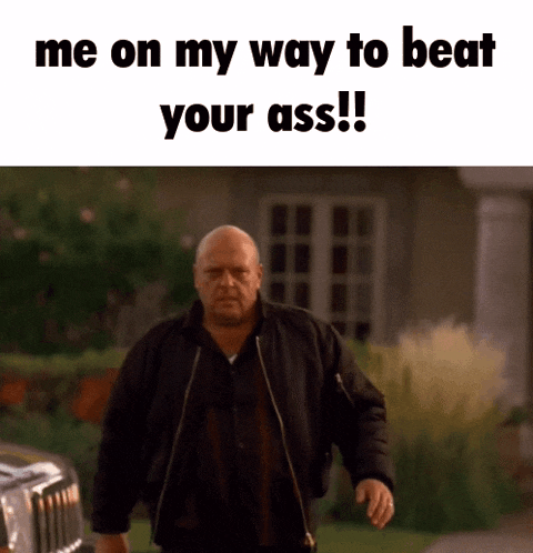 a man in a black jacket is walking down a street with the words " me on my way to beat your ass " on the bottom