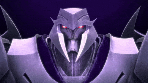 a robot with red eyes and sharp teeth